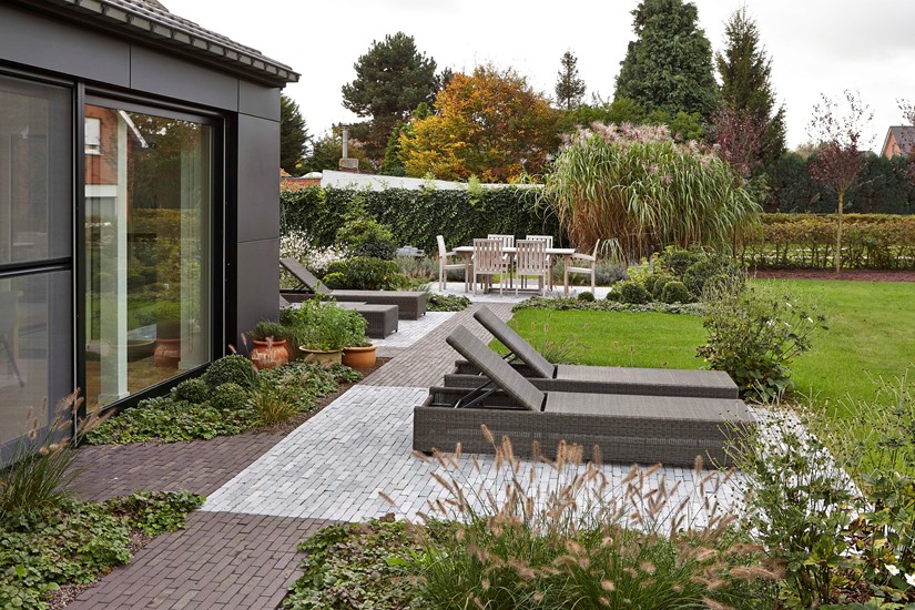 Transformation - maison mitoyenne Jardin Impressie 1